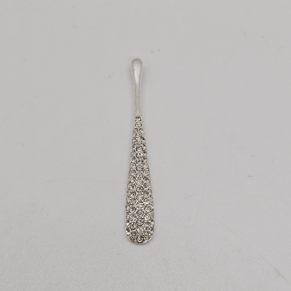 silver tone long skinny teardrop pendant with rhinestones